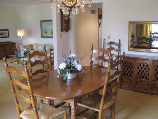 1210 Sequoia Road Rockford, IL 61108 - Photo 7 of 11 a dining room with furniture and wooden floor