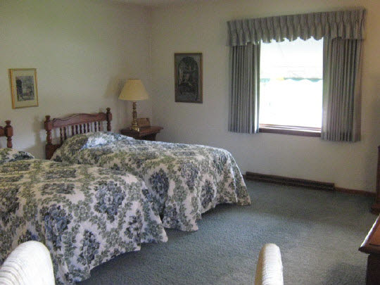 1210 Sequoia Road Rockford, IL 61108 - Photo 9 of 11 a bedroom with a bed and window