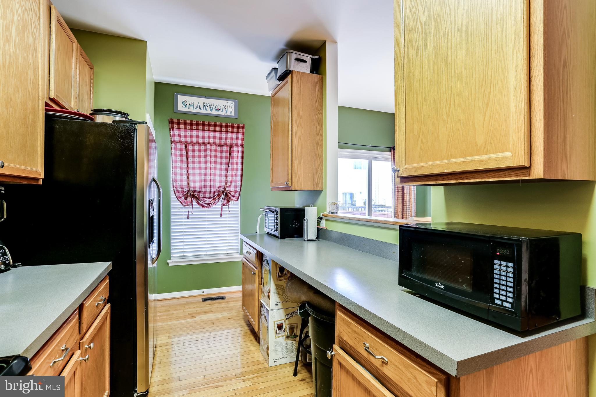 4120 Cutty Sark Road Baltimore, MD 21220 - Photo 7 of 29 Kitchen w/ Pass Thru to Dining Room