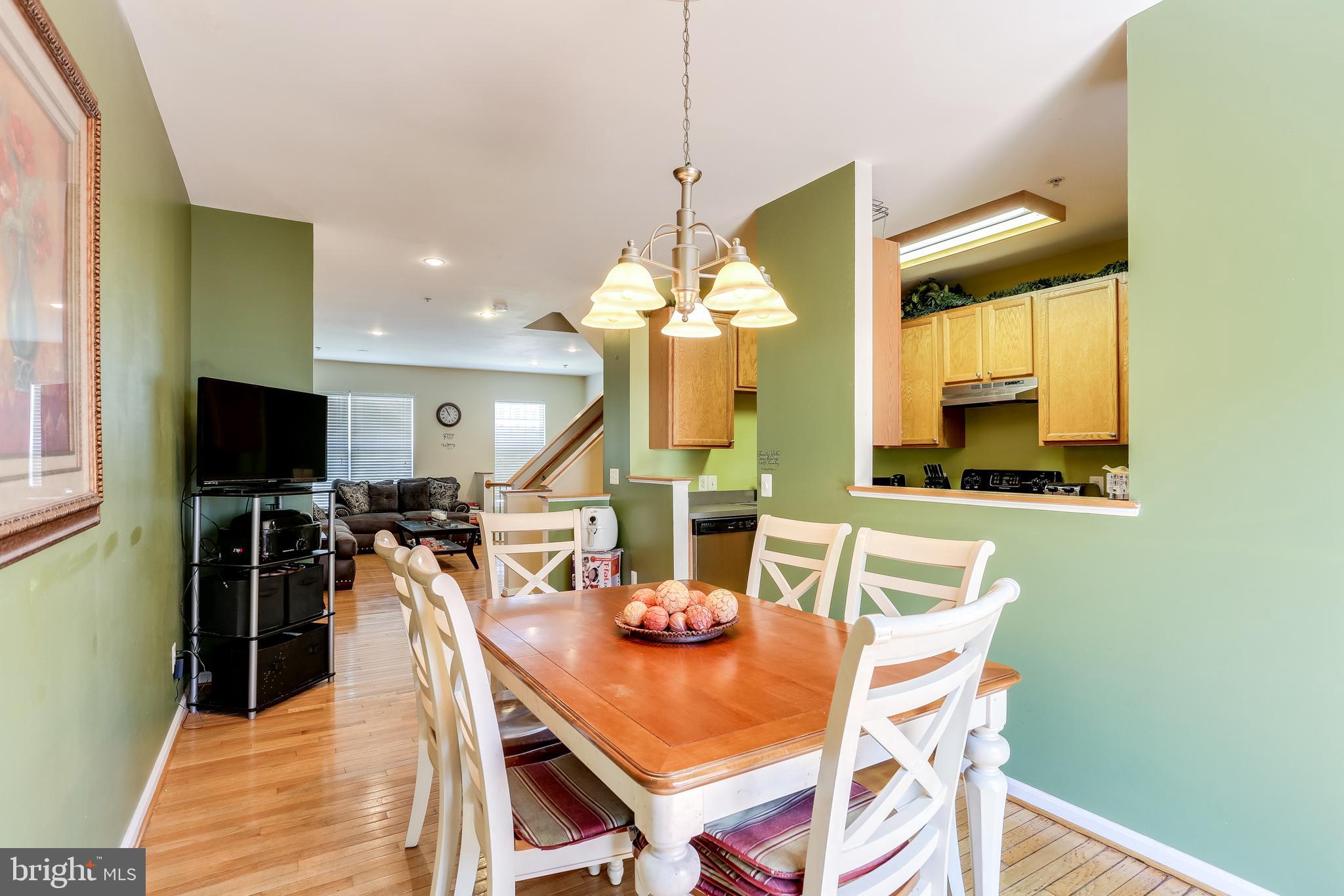 4120 Cutty Sark Road Baltimore, MD 21220 - Photo 9 of 29 Dining Room w/ Sliders to Rear Deck