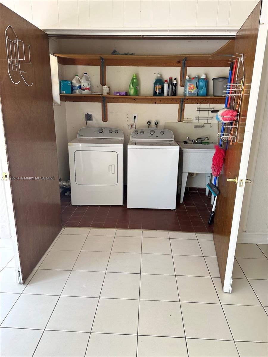 9110 Southwest 9th Terrace, Unit 9110 Miami, FL 33174 - Photo 16 of 17 a room with storage and utility