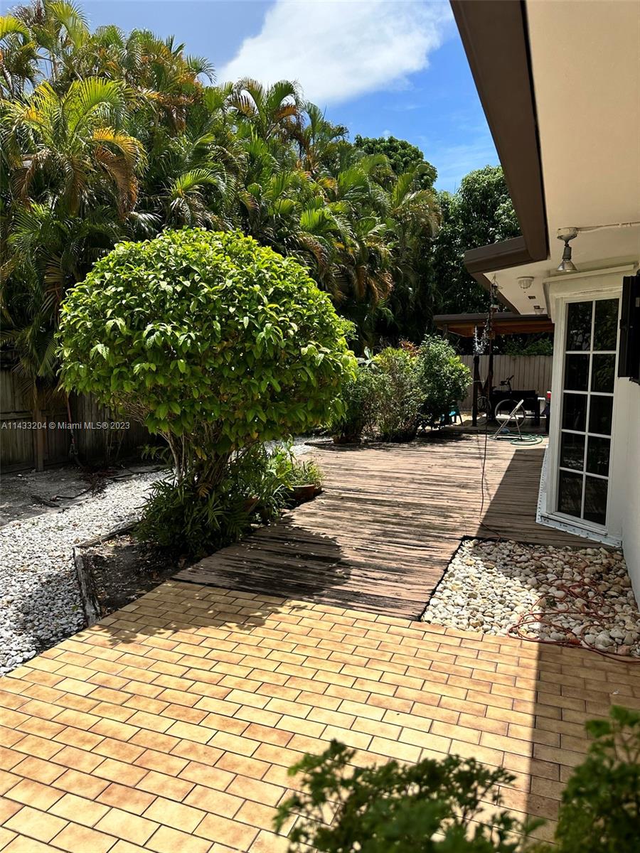 9110 Southwest 9th Terrace, Unit 9110 Miami, FL 33174 - Photo 3 of 17 a view of a backyard