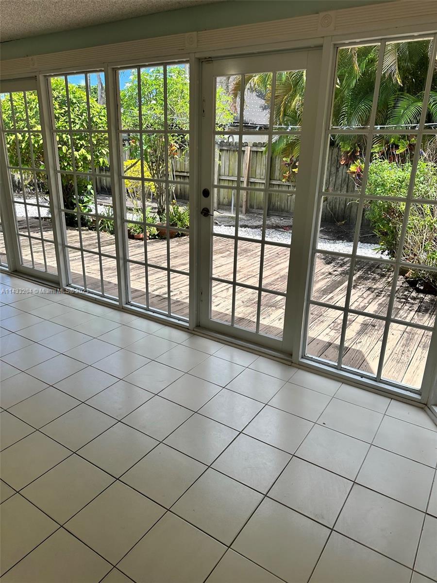 9110 Southwest 9th Terrace, Unit 9110 Miami, FL 33174 - Photo 5 of 17 a view of a room and workspace in a room