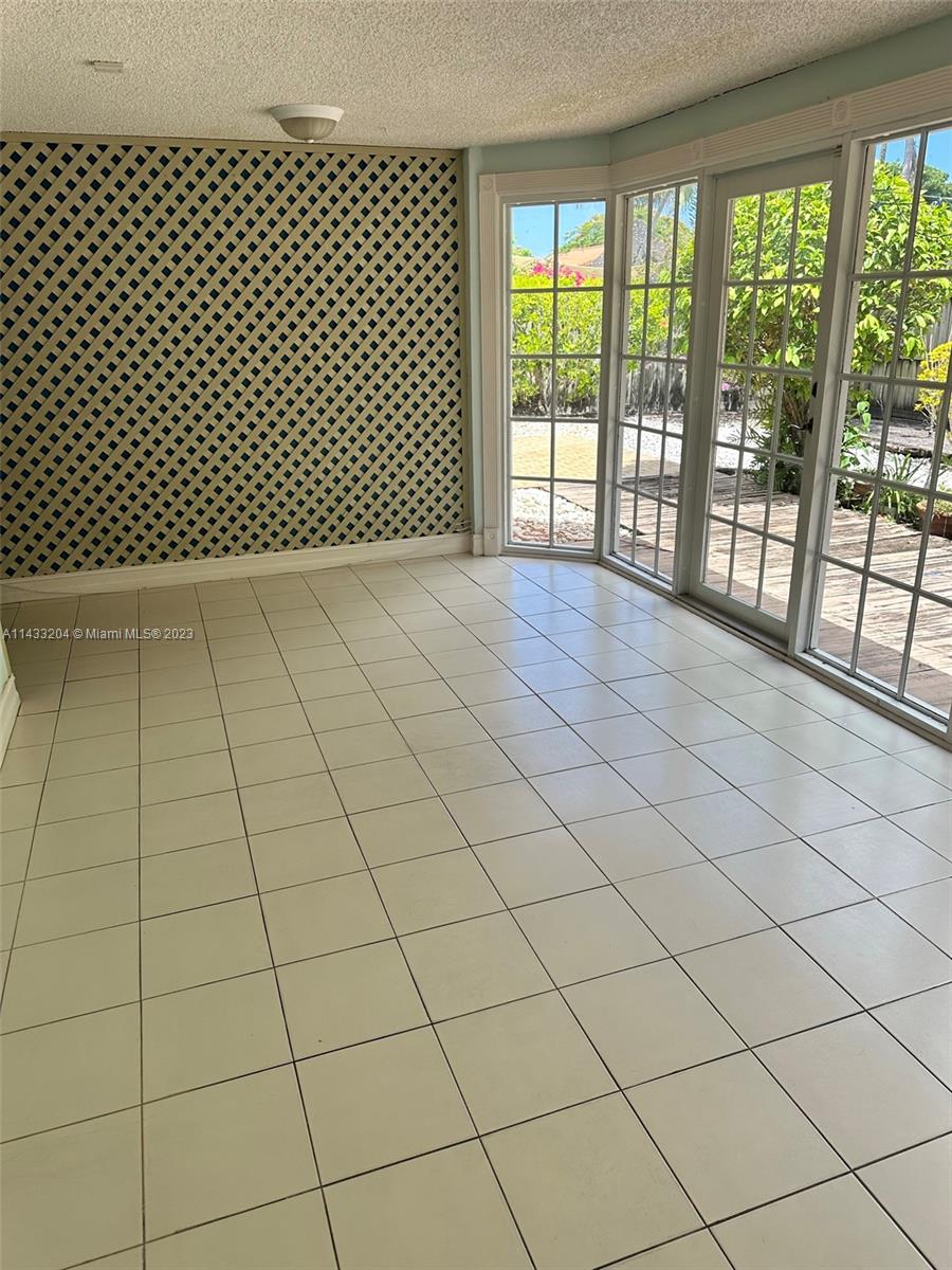 9110 Southwest 9th Terrace, Unit 9110 Miami, FL 33174 - Photo 6 of 17 a view of a room gate