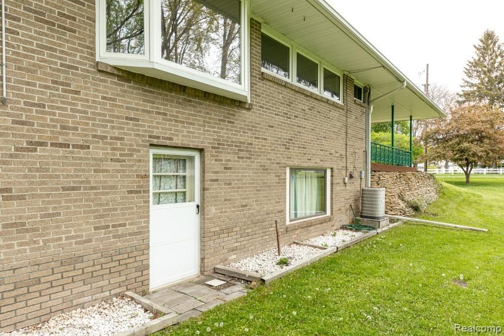 2801 Vrooman Road Jackson, MI 49203 - Photo 39 of 43 38 Rear Exterior Walk Out Basement Door 2801 Vrooman Rd (39 of 45) (Custom).jpg