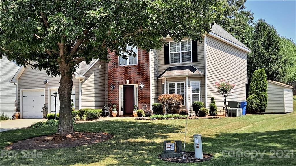 135 Scanlon Road Mooresville, NC 28115 - Photo 2 of 23 a front view of house with yard and green space
