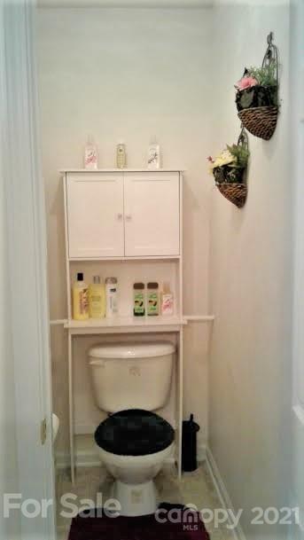 135 Scanlon Road Mooresville, NC 28115 - Photo 19 of 23 a bathroom with a toilet and a sink