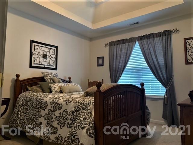 135 Scanlon Road Mooresville, NC 28115 - Photo 20 of 23 a bedroom with a bed and a window
