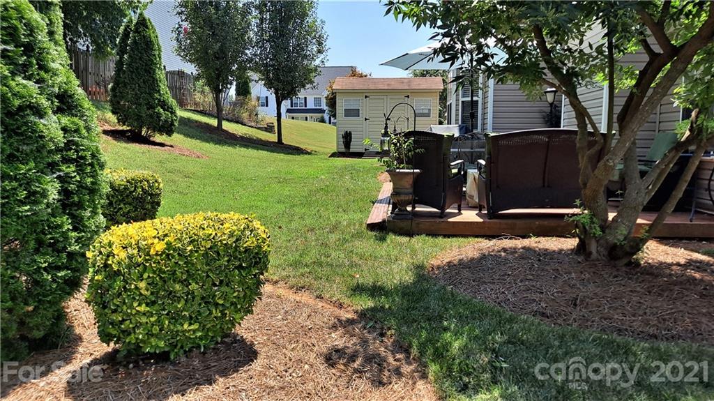 135 Scanlon Road Mooresville, NC 28115 - Photo 4 of 23 a view of a house with backyard