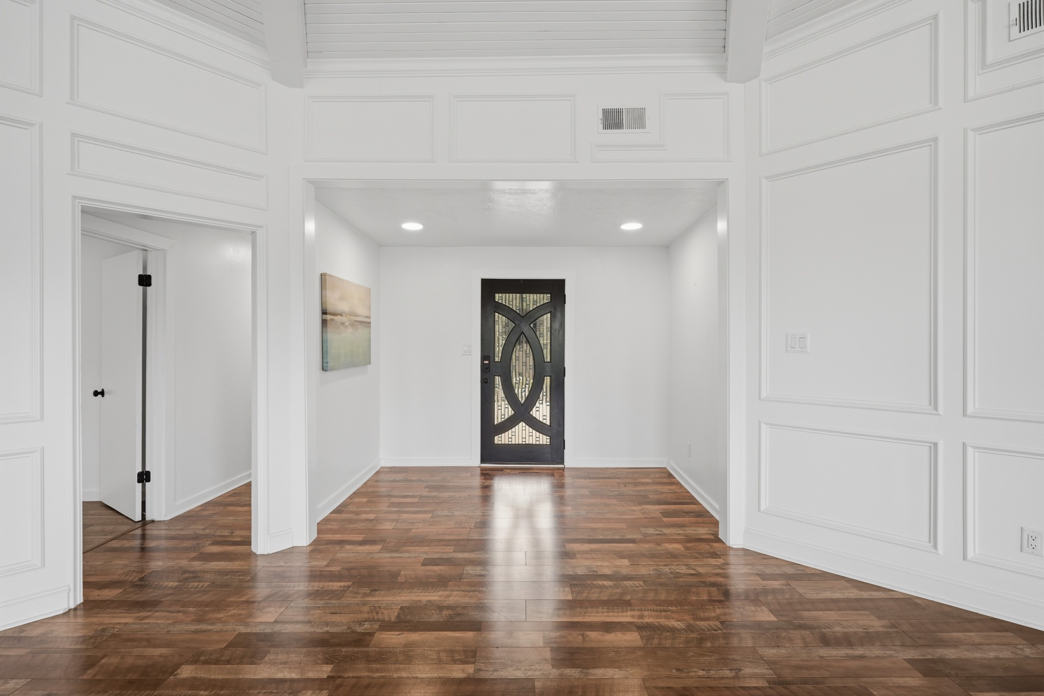 79 Summers Wind Street Conroe, TX 77356 - Photo 4 of 45 a view of an empty room and wooden floor
