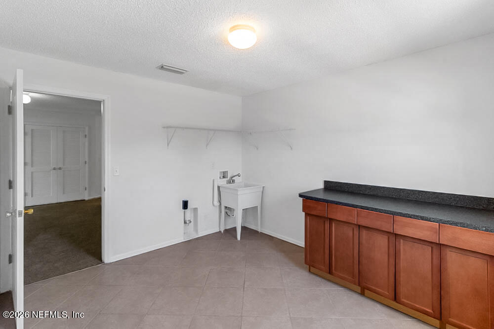 2387 Rusty Lakes Lane Jacksonville, FL 32221 - Photo 34 of 50 Laundry Room