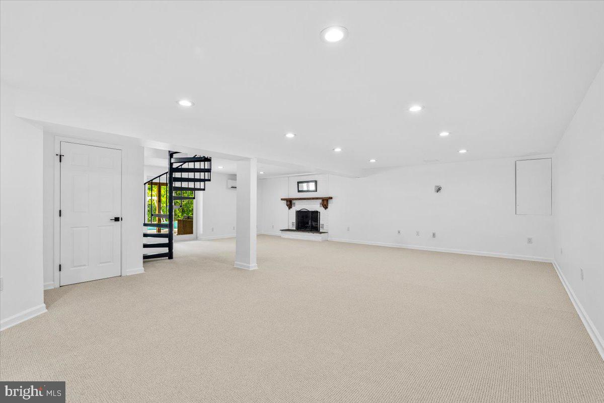 6117 Long Branch Road Frederick, MD 21701 - Photo 37 of 75 a view of empty room with fireplace and window