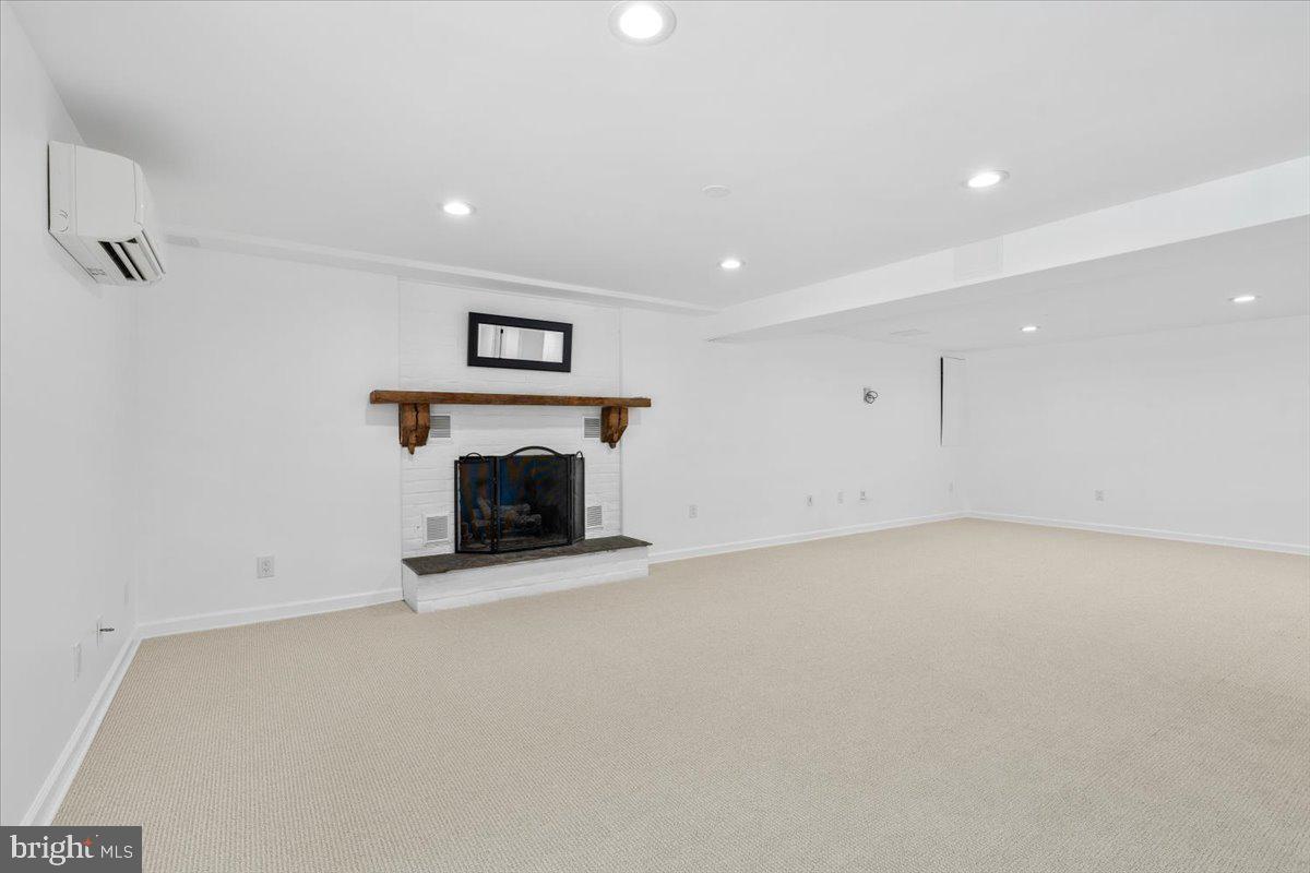 6117 Long Branch Road Frederick, MD 21701 - Photo 38 of 75 a view of empty room with fireplace