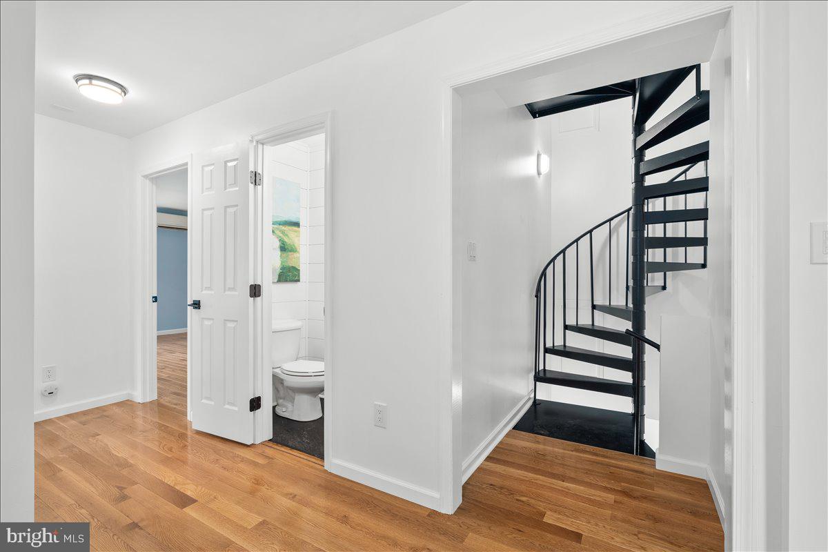 6117 Long Branch Road Frederick, MD 21701 - Photo 5 of 75 a view of a room with wooden floor and window