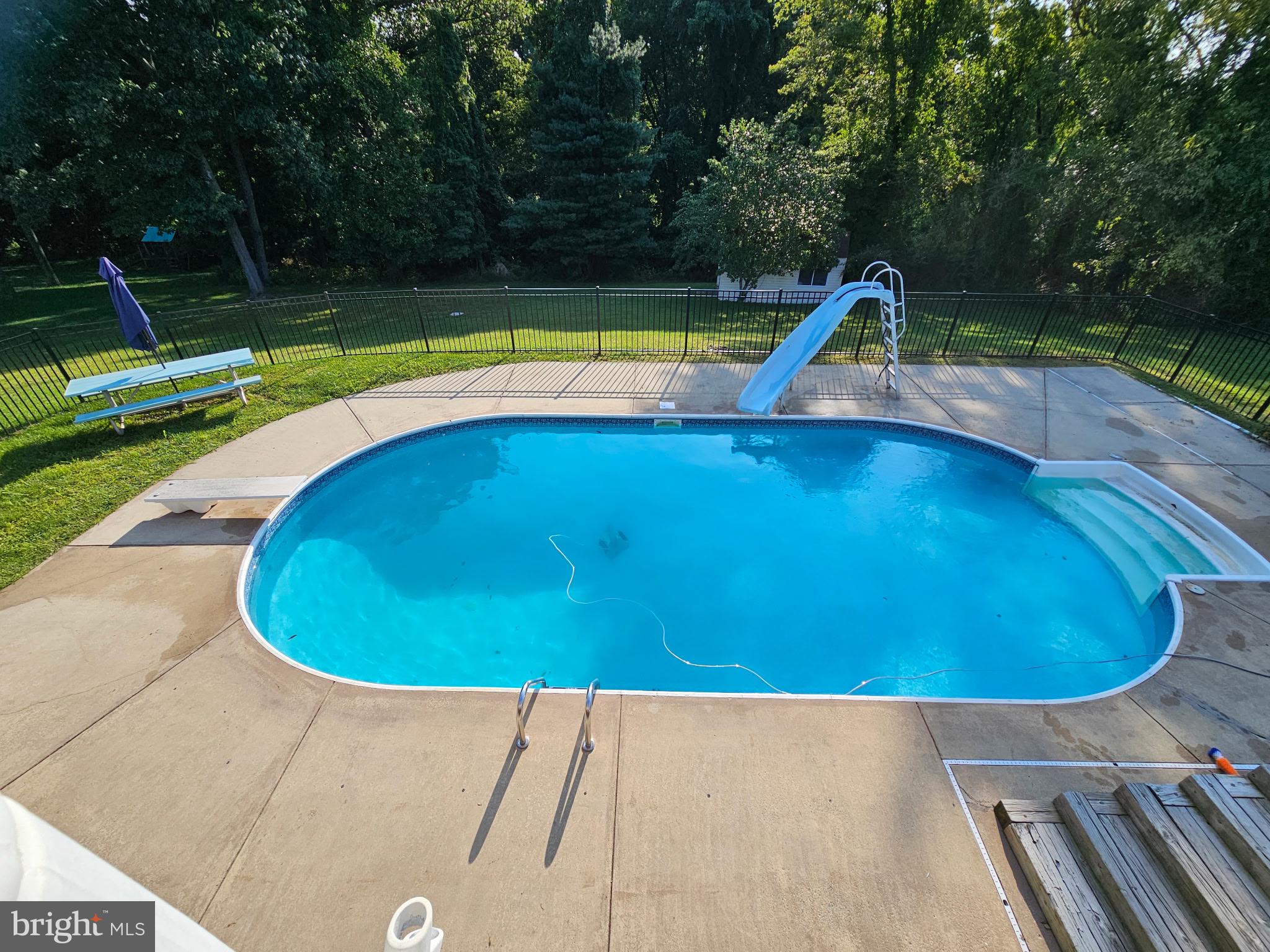 6117 Long Branch Road Frederick, MD 21701 - Photo 57 of 75 a view of swimming pool with a yard