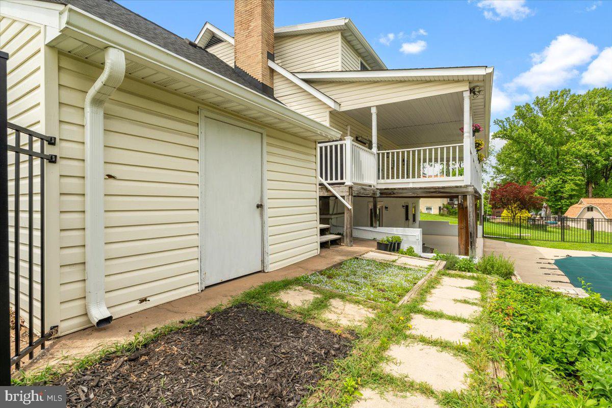 6117 Long Branch Road Frederick, MD 21701 - Photo 58 of 75 a view of a house with a yard and sitting area