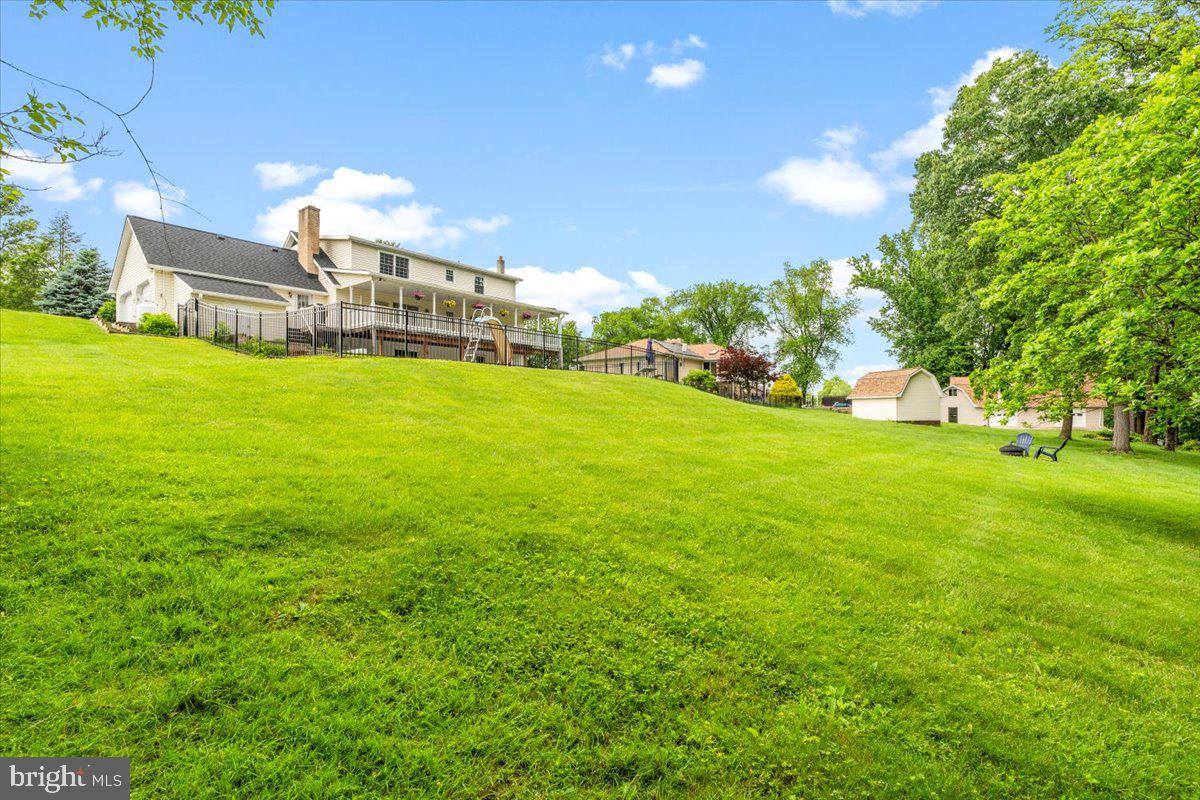6117 Long Branch Road Frederick, MD 21701 - Photo 61 of 75 a view of a house with a big yard