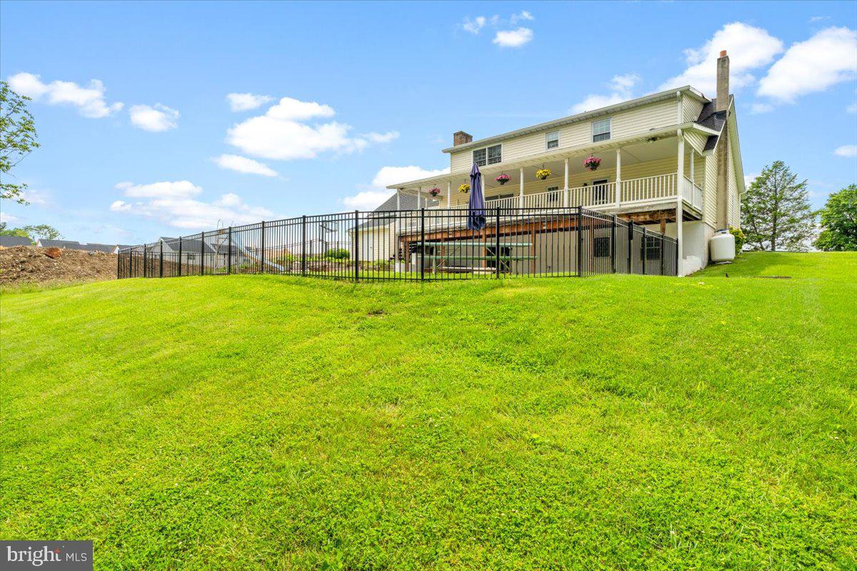 6117 Long Branch Road Frederick, MD 21701 - Photo 62 of 75 a view of a big yard with a big yard and large trees