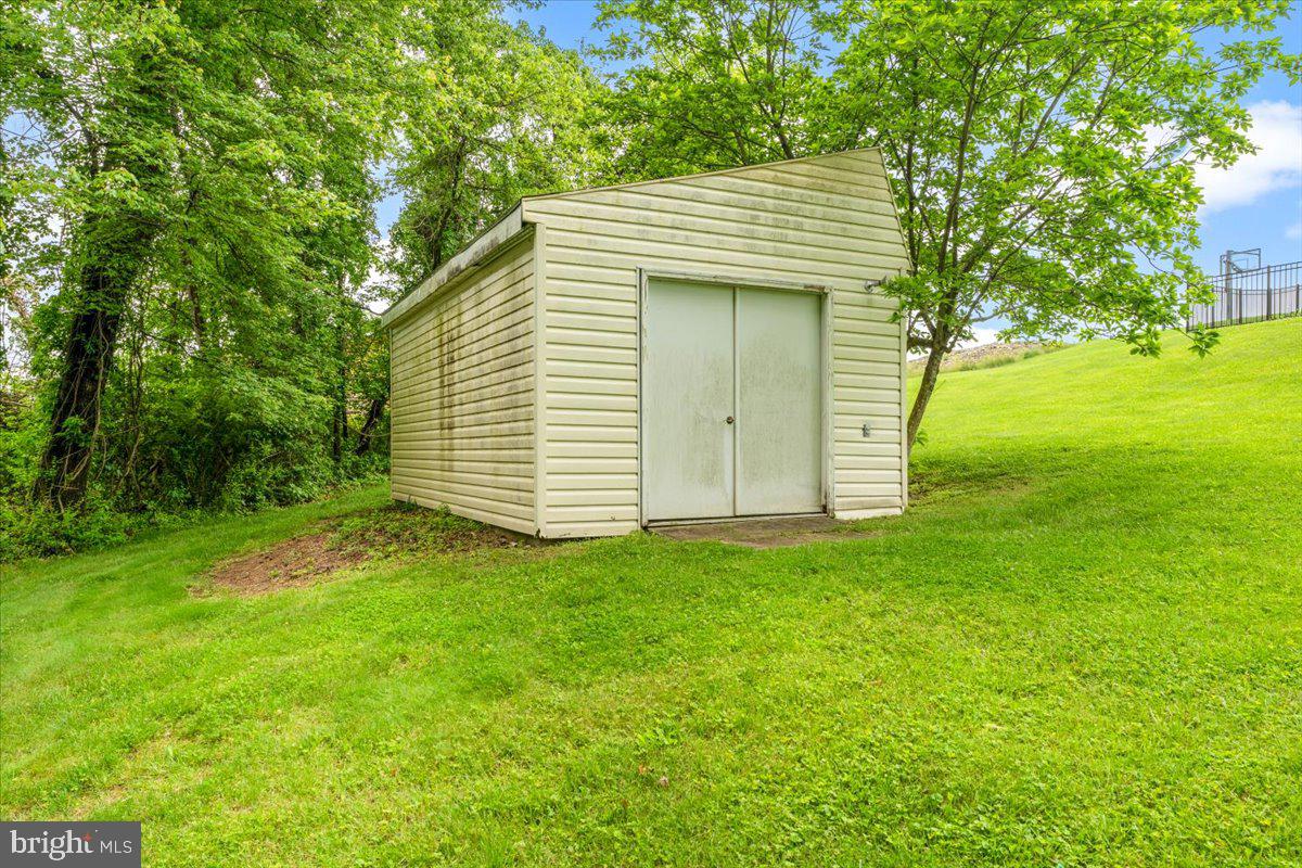 6117 Long Branch Road Frederick, MD 21701 - Photo 66 of 75 a view of a house with a yard