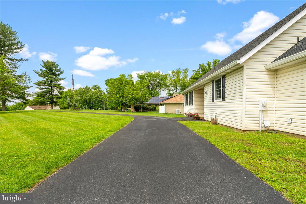 6117 Long Branch Road Frederick, MD 21701 - Photo 67 of 75 a front view of a house with yard