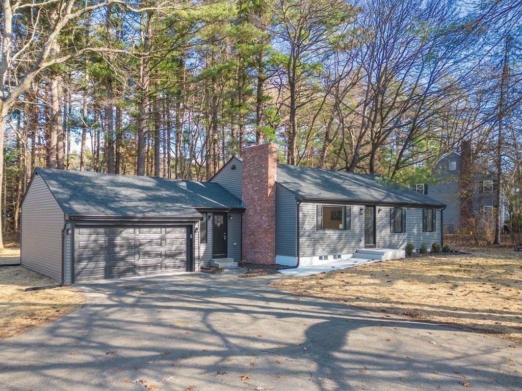 286 Hudson Road Sudbury, MA 01776 - Photo 1 of 34 a view of a house with a outdoor space