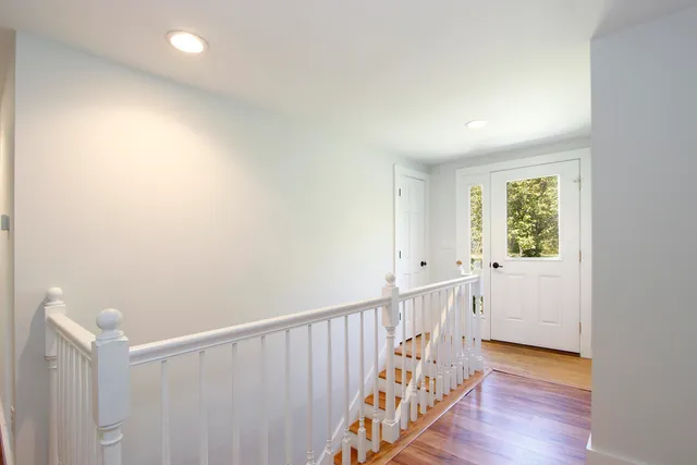 a bathroom with a sink a vanity and a toilet
