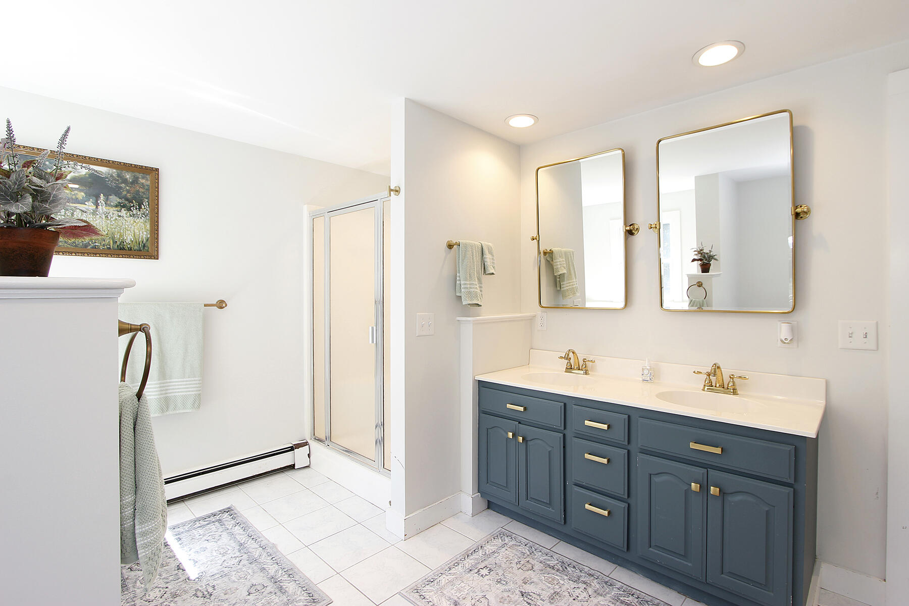 70 Deerfield Lane Eastham, MA 02642 - Photo 28 of 48 a bathroom with a double vanity sink mirror and double
