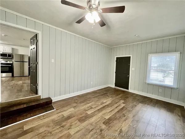 a view of an empty room and window