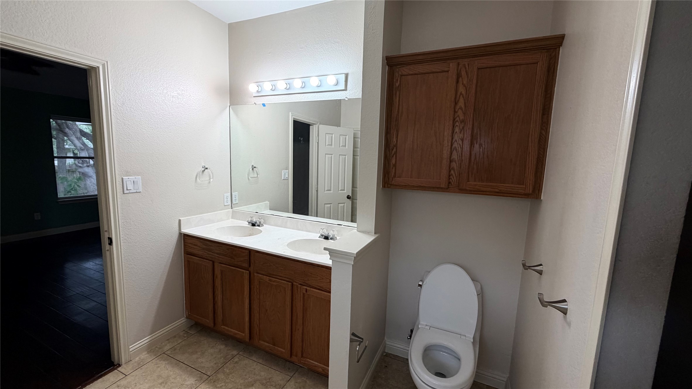 3356 Cantera Way Round Rock, TX 78681 - Photo 17 of 22 a bathroom with a sink and a mirror
