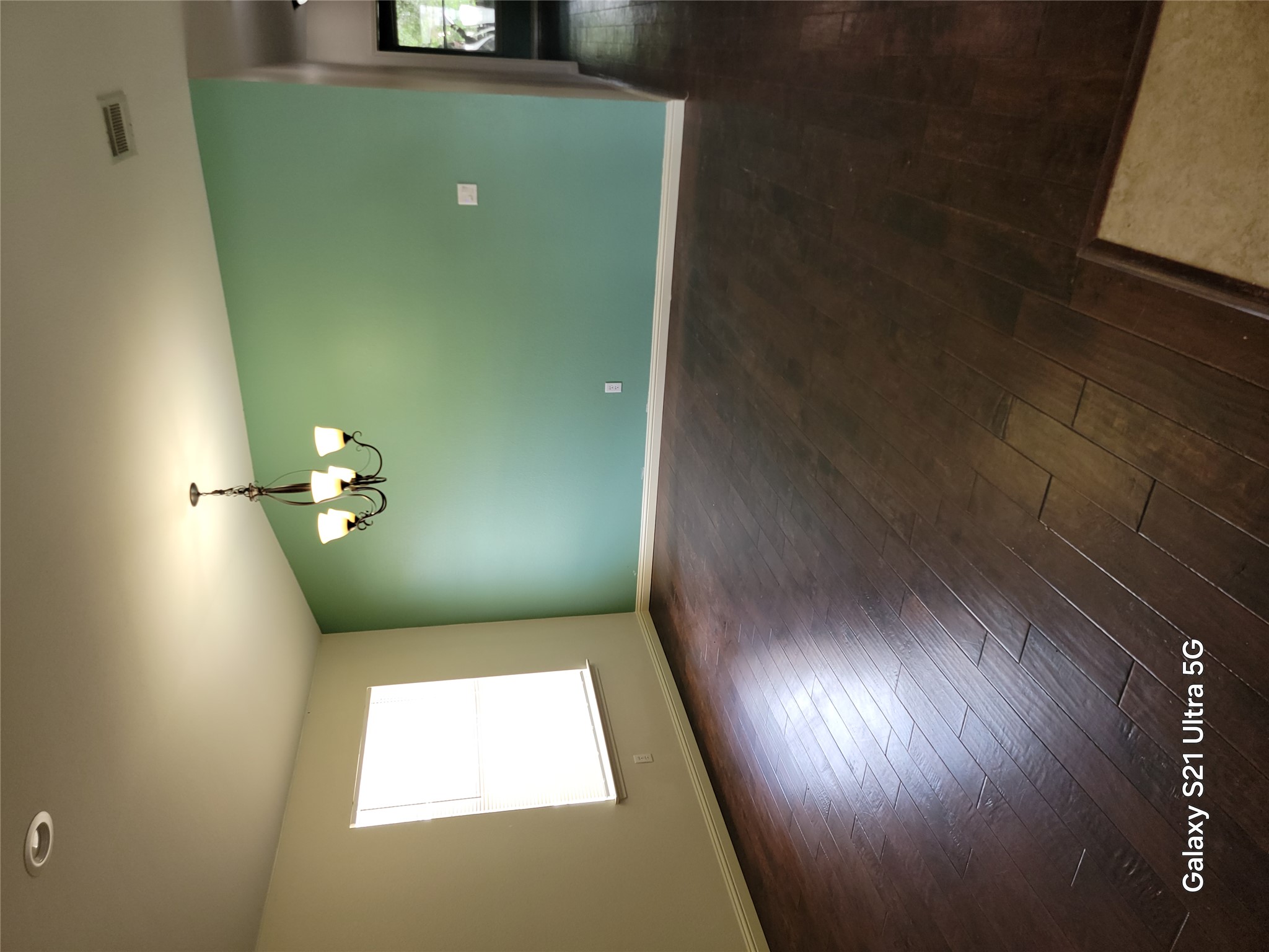 3356 Cantera Way Round Rock, TX 78681 - Photo 2 of 22 an empty room with wooden floor and windows