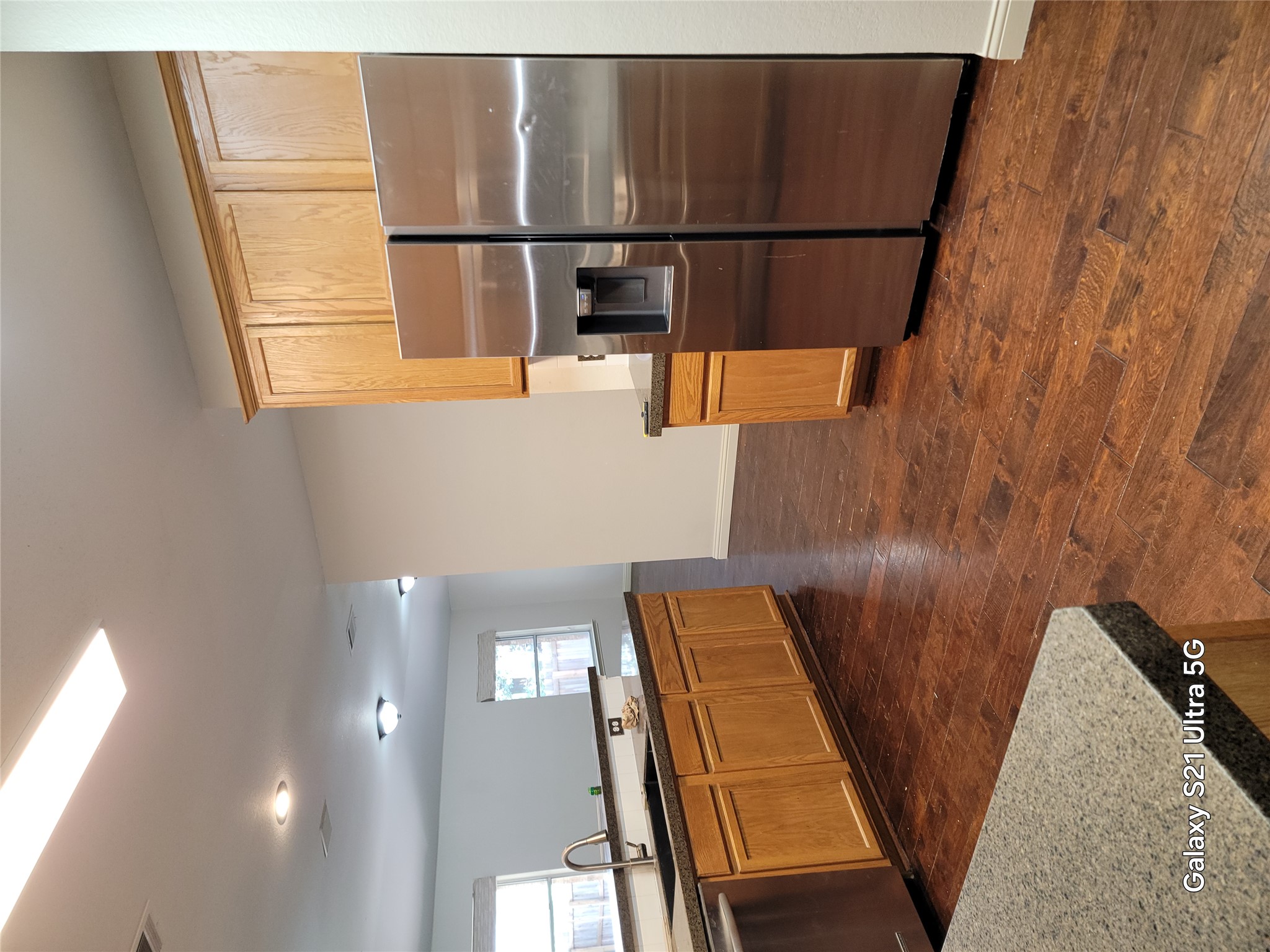 3356 Cantera Way Round Rock, TX 78681 - Photo 4 of 22 a kitchen with granite countertop a refrigerator a sink a stove and cabinets