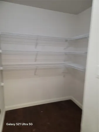 a view of small space with racks on the wall