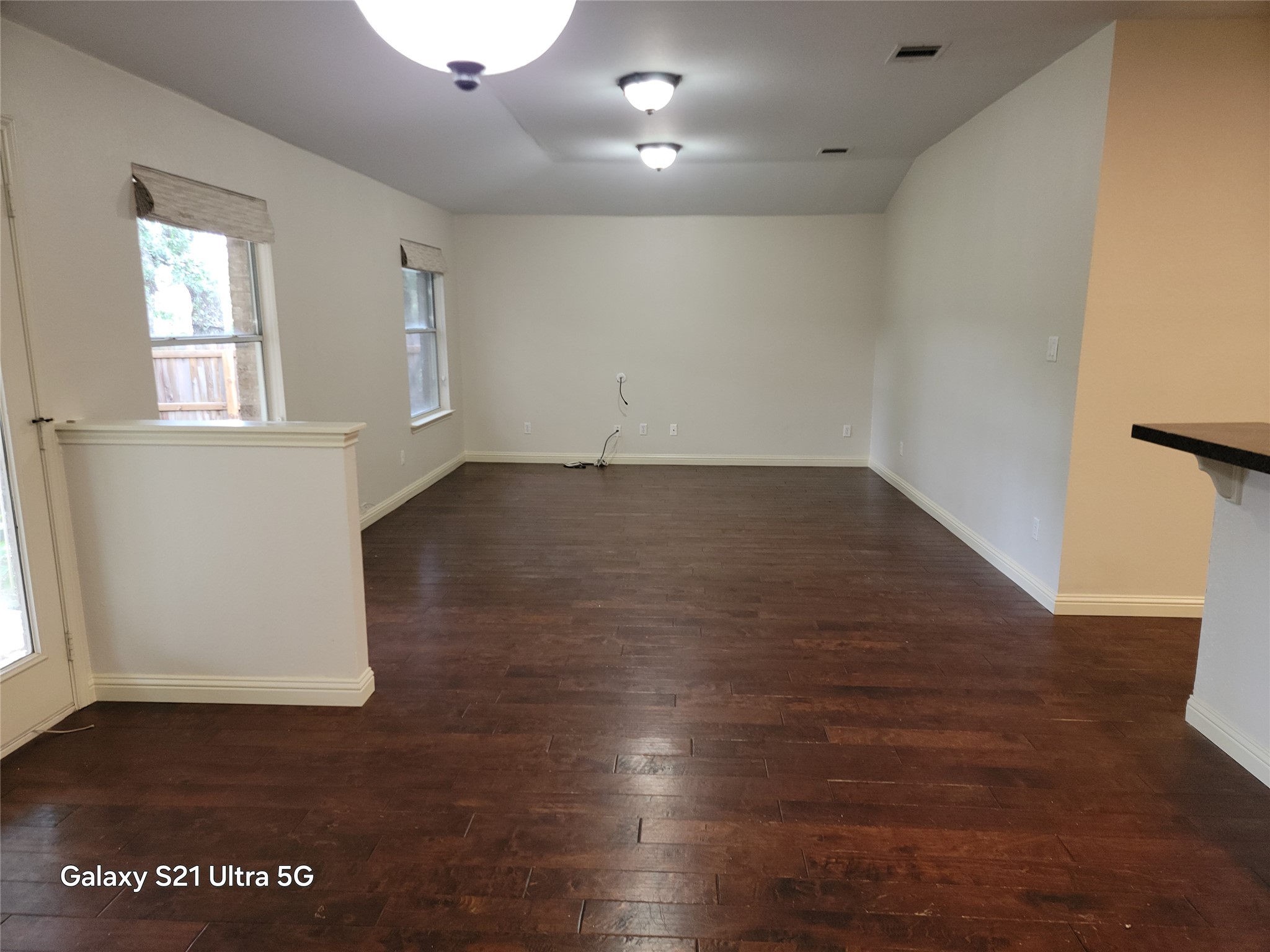 3356 Cantera Way Round Rock, TX 78681 - Photo 10 of 22 an empty room with wooden floor and windows