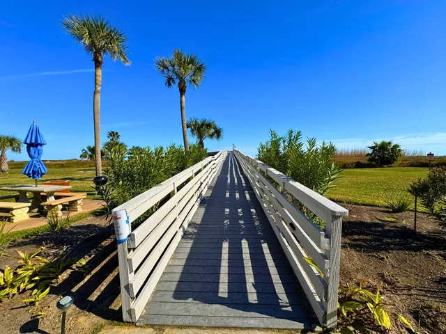 a view of a balcony with an ocean
