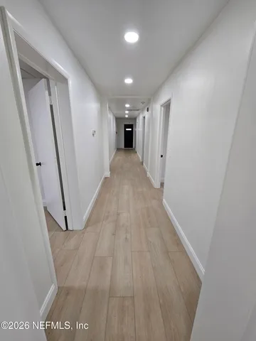 a view of hallway with stairs