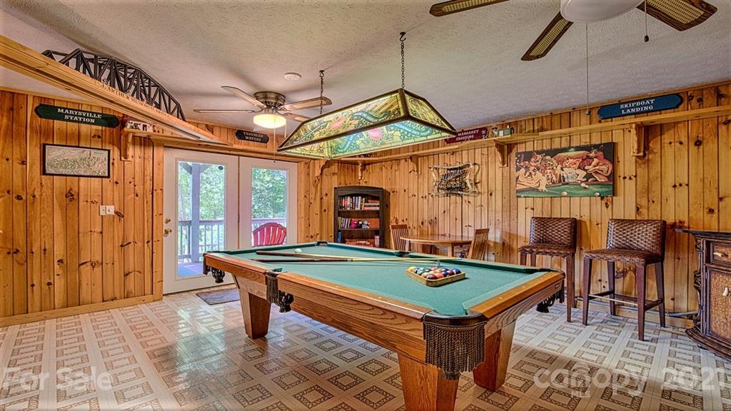 49 Sunrise Ridge Maggie Valley, NC 28751 - Photo 21 of 24 a room with pool table and windows
