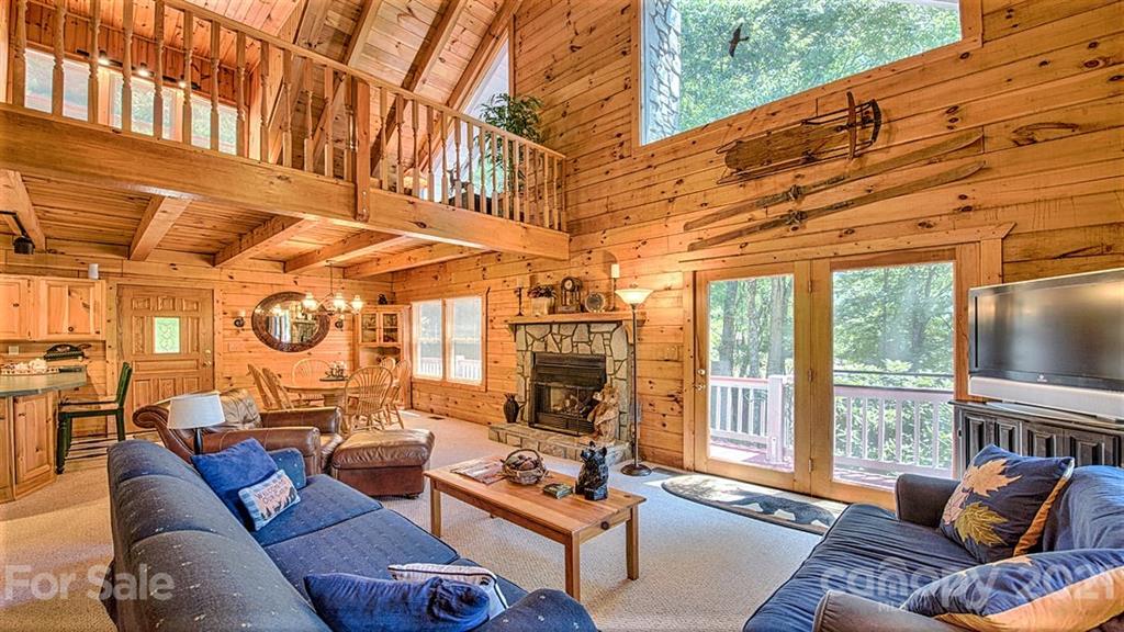 49 Sunrise Ridge Maggie Valley, NC 28751 - Photo 4 of 24 a building outdoor space with patio furniture