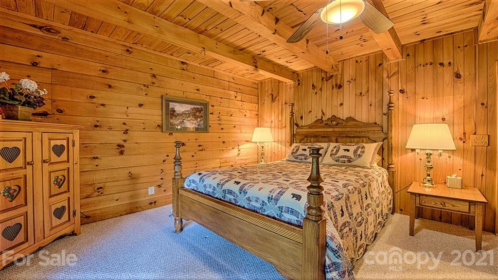 49 Sunrise Ridge Maggie Valley, NC 28751 - Photo 10 of 24 a bedroom with a bed and a table