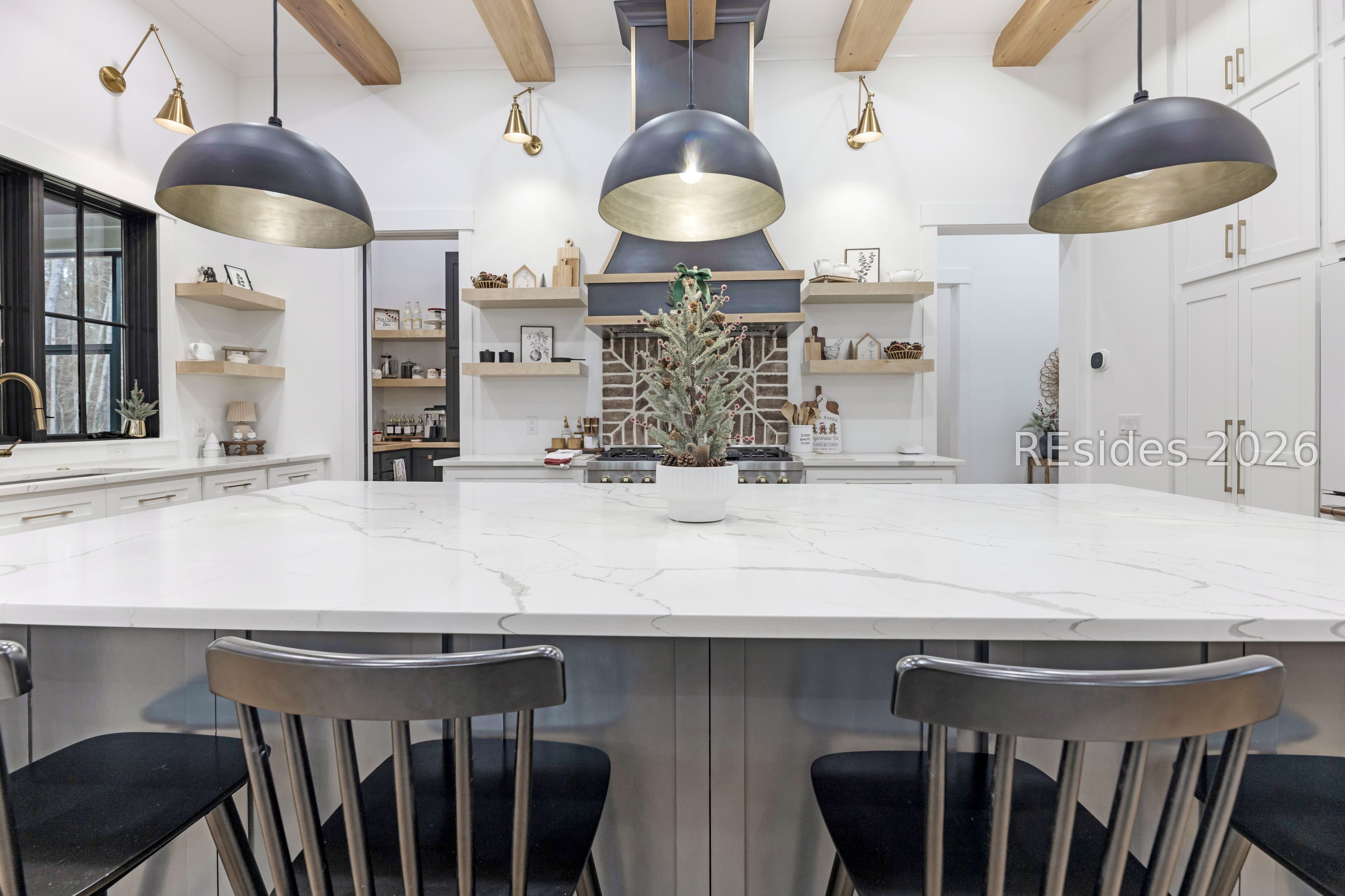 31 Foxchase Lane Bluffton, SC 29910 - Photo 13 of 80 View from sitting at counter to kitchen