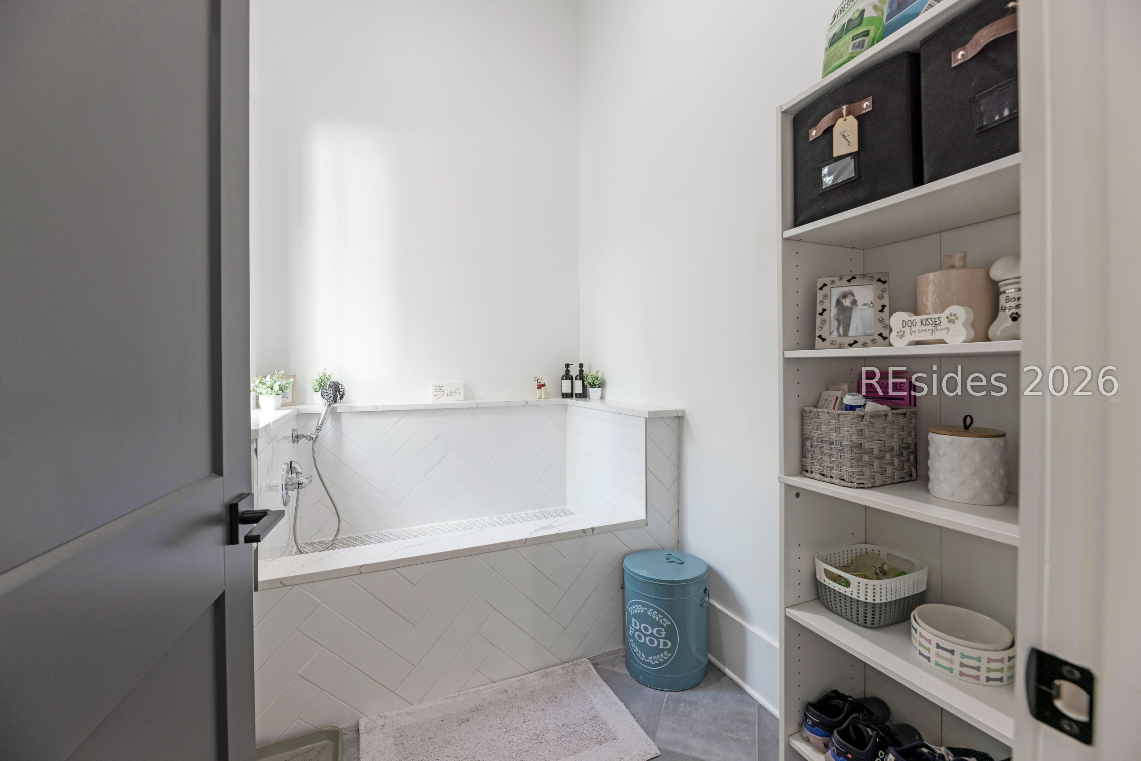 31 Foxchase Lane Bluffton, SC 29910 - Photo 34 of 80 Pet spa with storage shelves