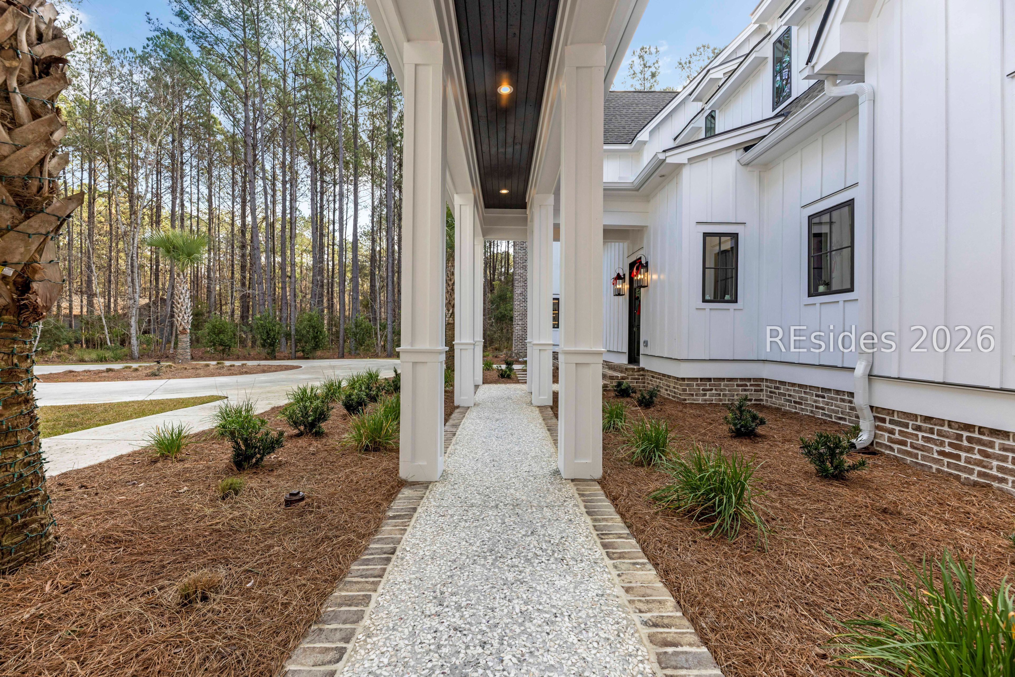 31 Foxchase Lane Bluffton, SC 29910 - Photo 61 of 80 View from side entrance to garage & guest quarters
