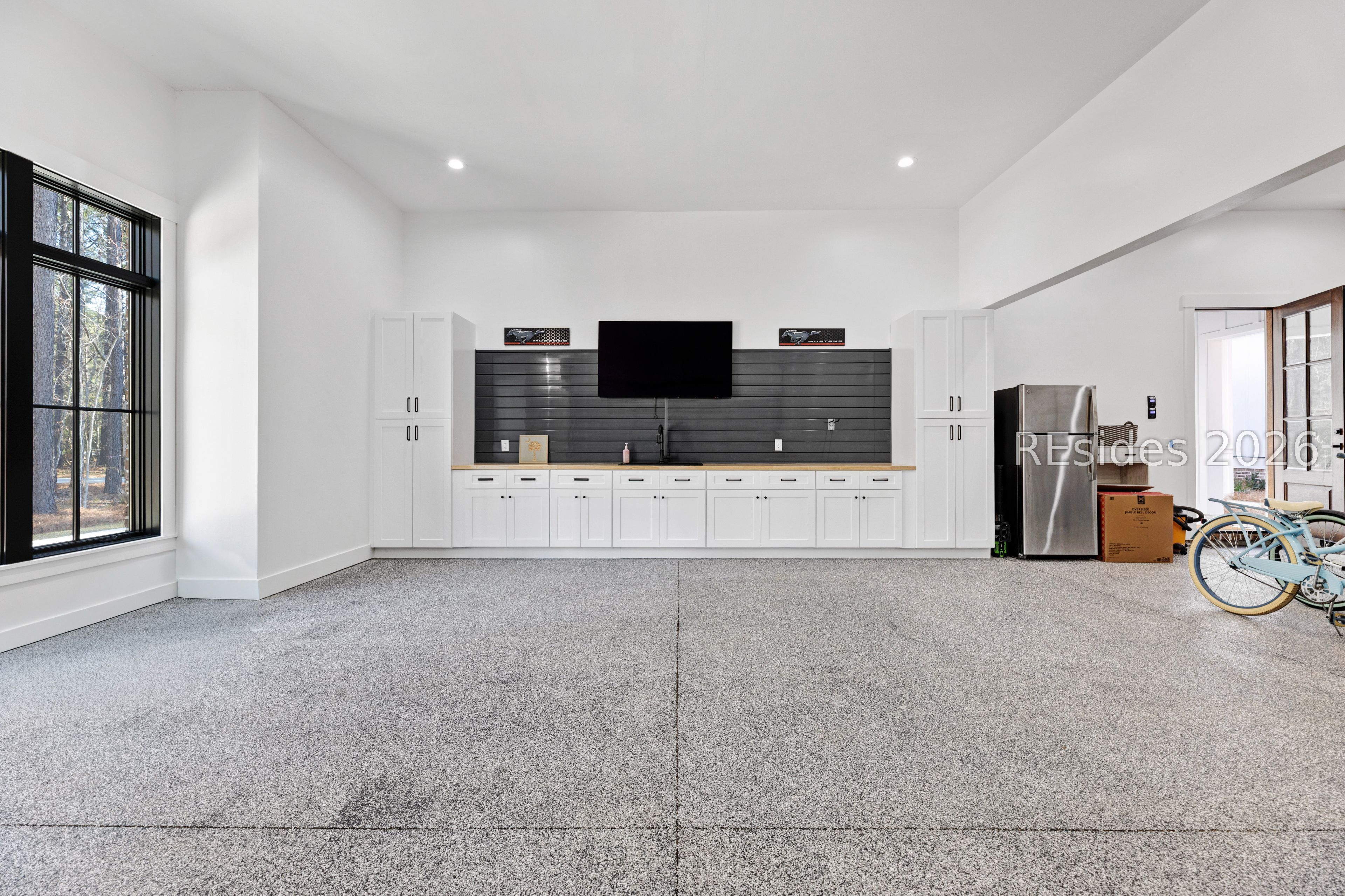 31 Foxchase Lane Bluffton, SC 29910 - Photo 63 of 80 Finished garage work area-Large TV-storage