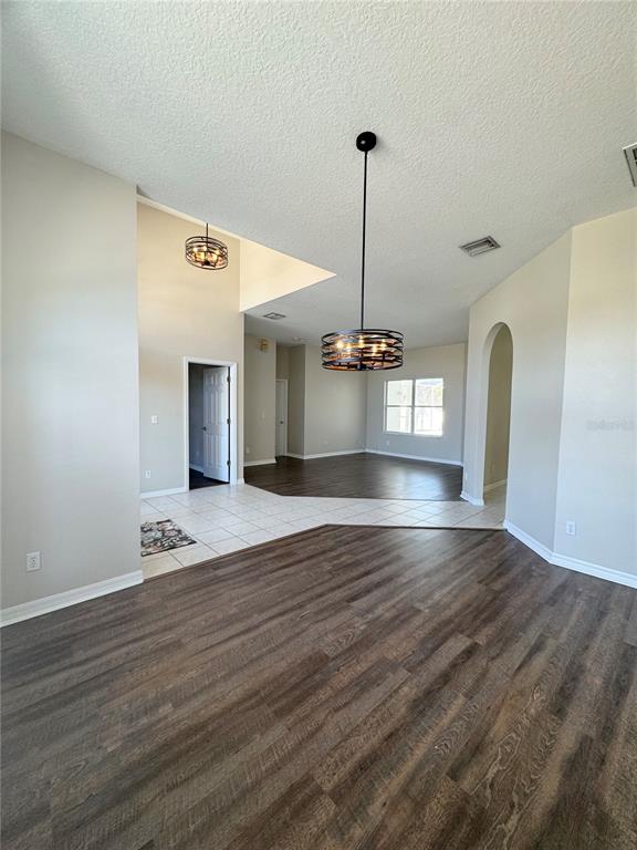 28724 Hanging Moss Loop Wesley Chapel, FL 33543 - Photo 5 of 30 a view of empty room with wooden floor