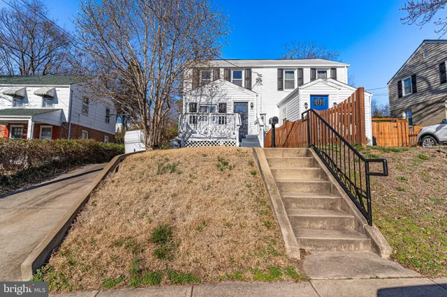 a front view of a house with yard