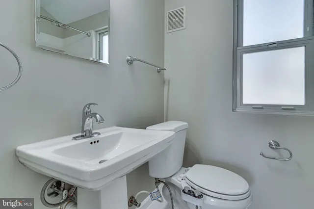 a bathroom with a shower and a bathtub