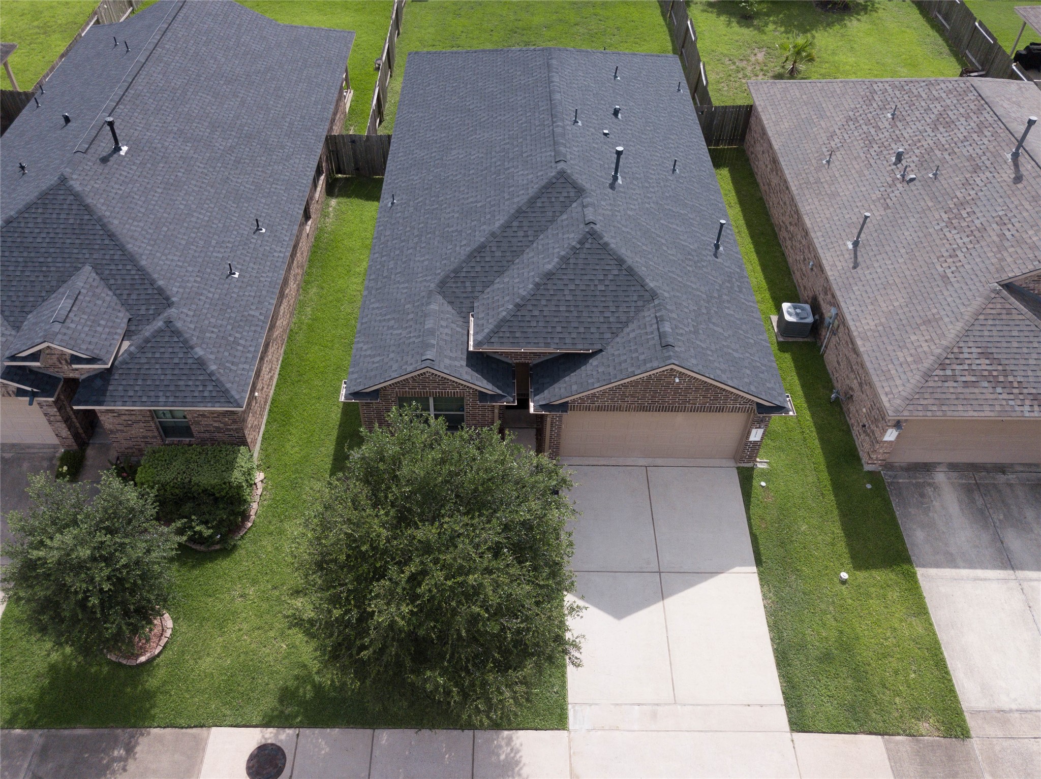 24423 Raindrop Poppy Drive Spring, TX 77373 - Photo 28 of 29 an aerial view of a house with a yard
