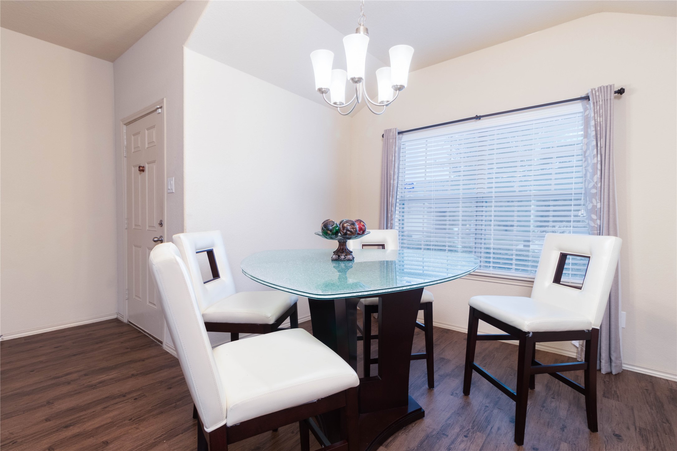 24423 Raindrop Poppy Drive Spring, TX 77373 - Photo 8 of 29 a view of a dining room with furniture and wooden floor