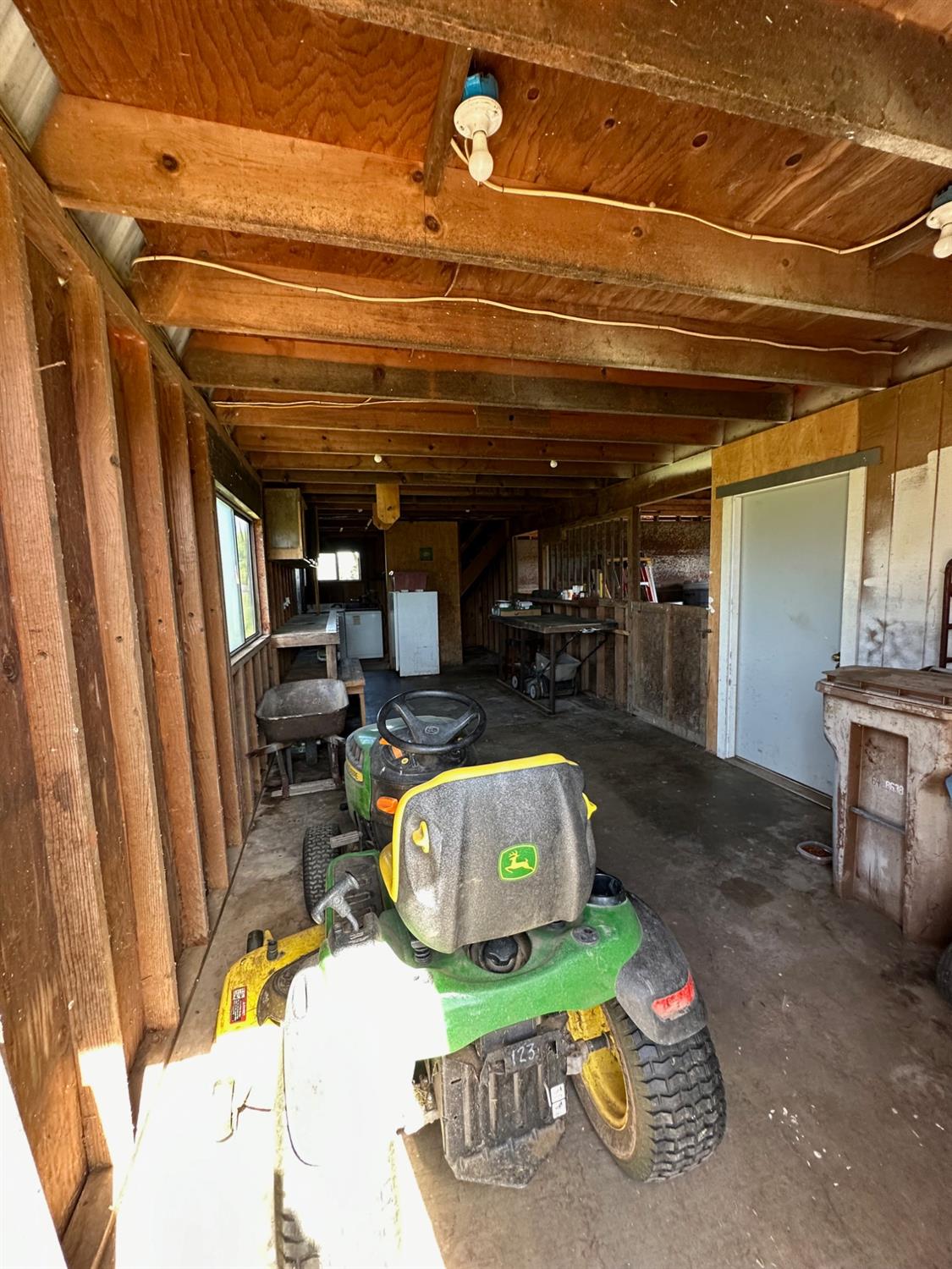 11375 Alta Mesa Road Wilton, CA 95693 - Photo 11 of 27 a storage room with furniture