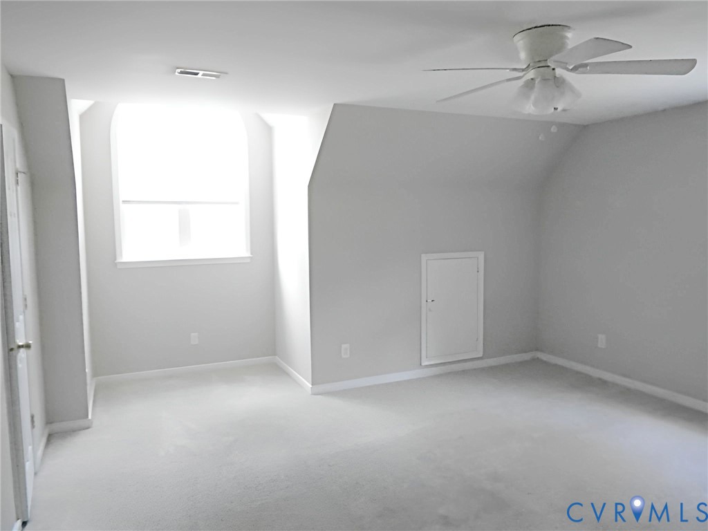 3535 Tavern Road Petersburg, VA 23805 - Photo 19 of 20 an empty room with a window and a fan