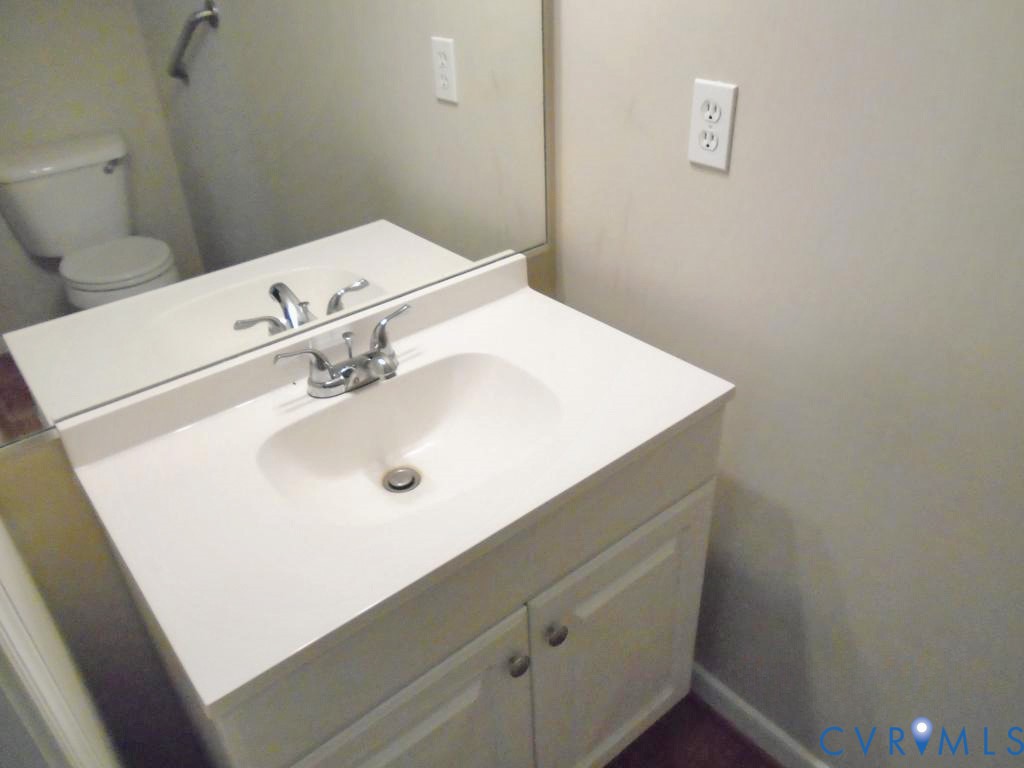 3535 Tavern Road Petersburg, VA 23805 - Photo 9 of 20 a bathroom with a sink and a toilet